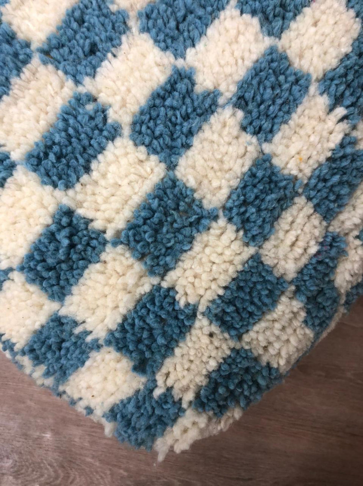 Moroccan Berber light Blue and white large checkered pouf ottoman.