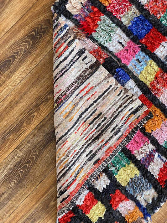 3x8 ft Moroccan Boucherouite runner rug.