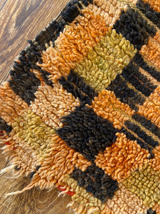 5x6 ft Moroccan vintage checkered rug.