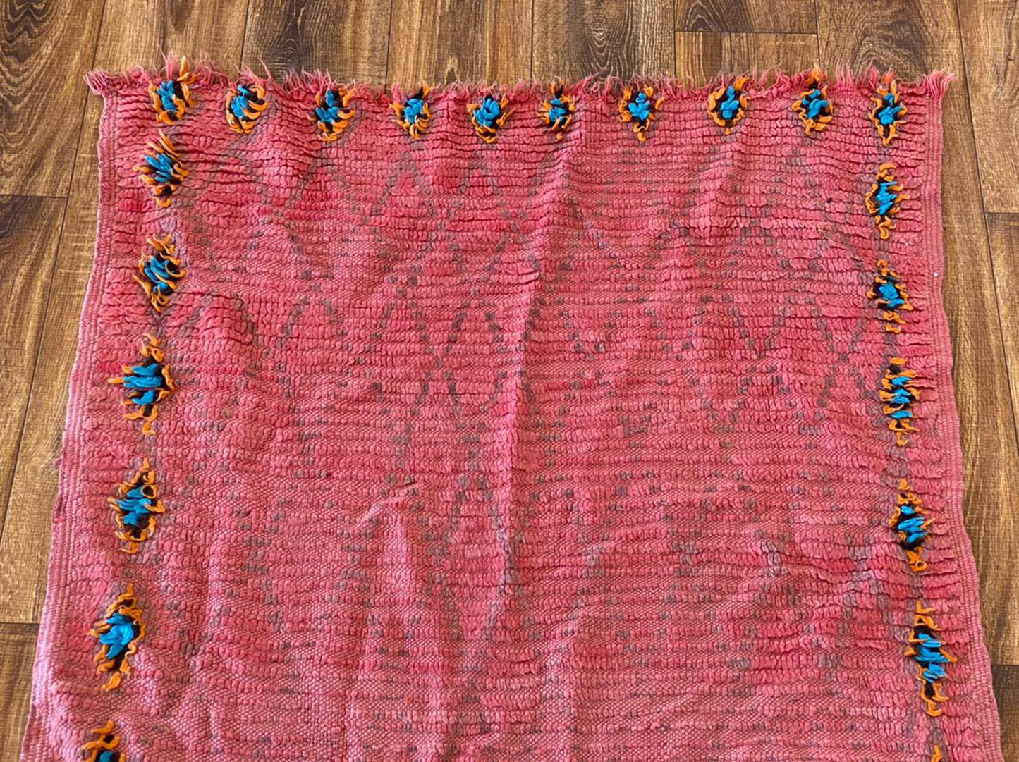 3x8 ft vintage Moroccan pink area rug.