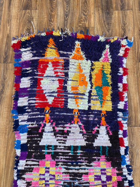 3x8 ft colorful Moroccan runner rug.