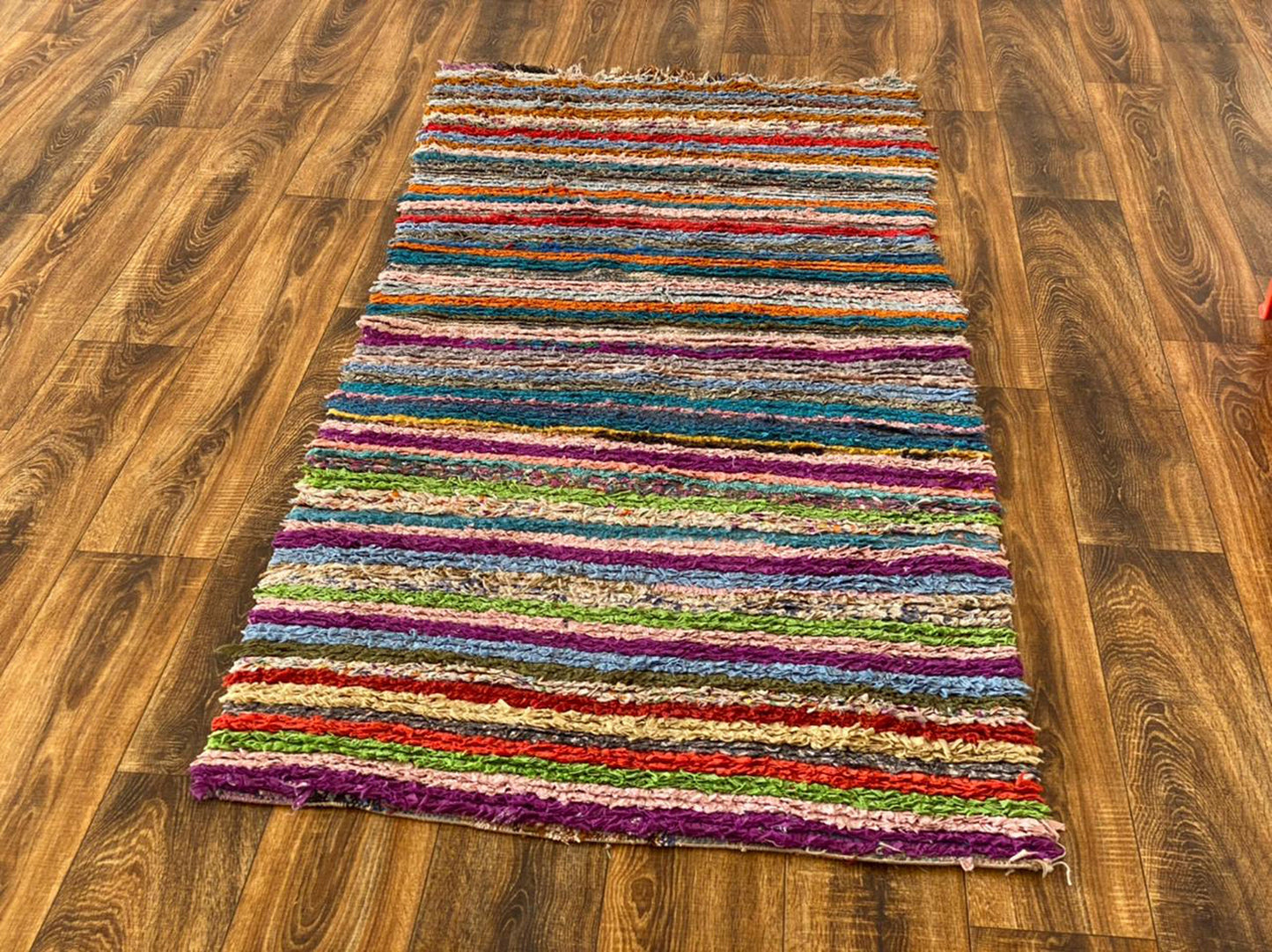 3x7 ft Boucherouite Moroccan striped rug.