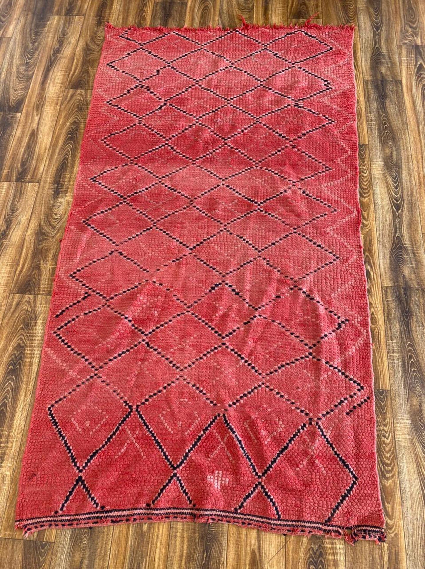 4x7 ft vintage Moroccan pink area rug.