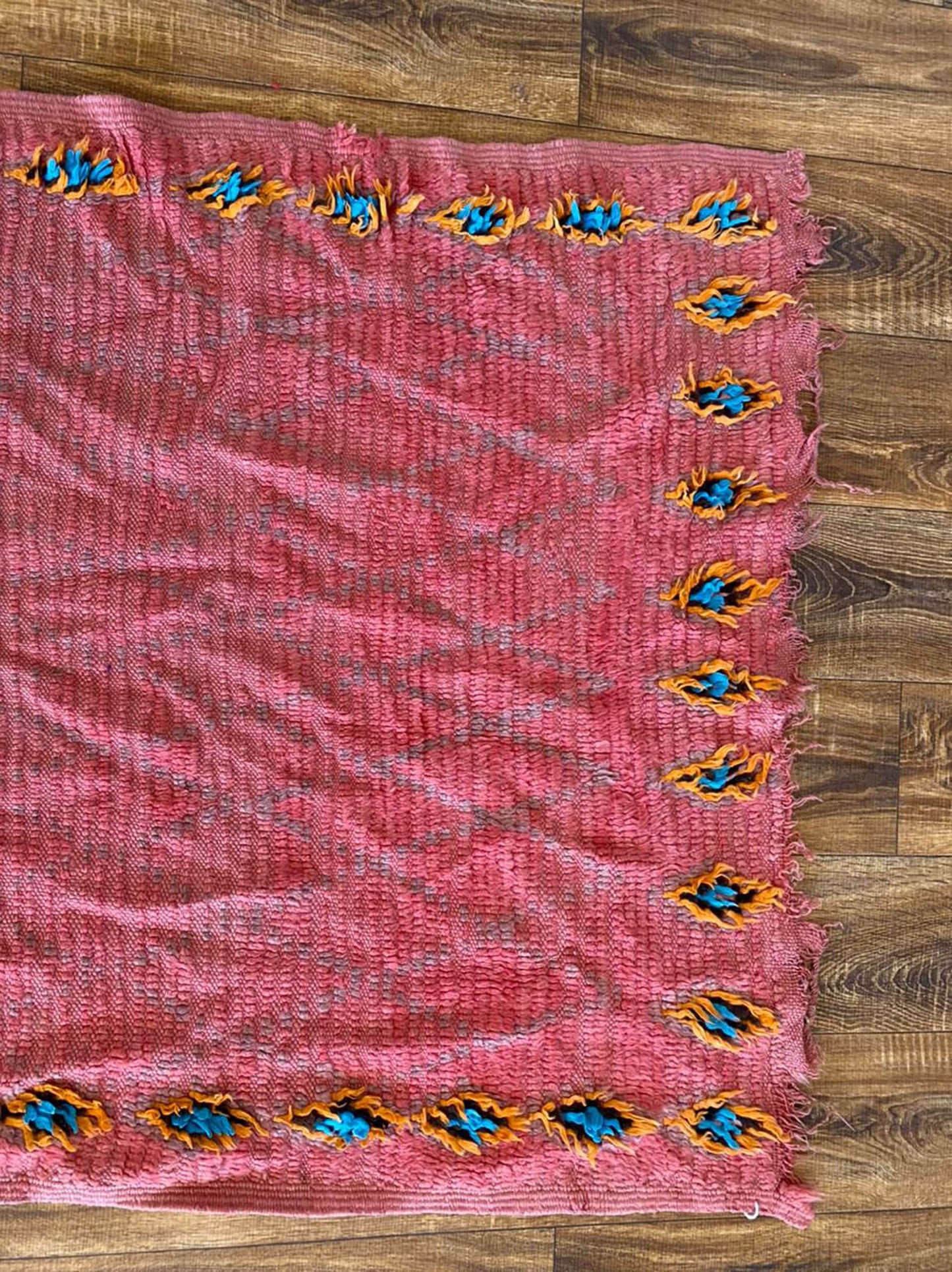 3x8 ft vintage Moroccan pink area rug.