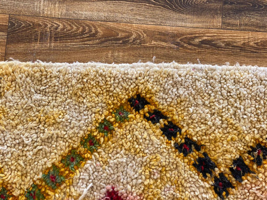 4x8 ft vintage Moroccan area rug.