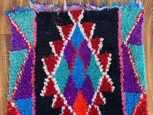 Small Moroccan vintage rug 2x5 ft.