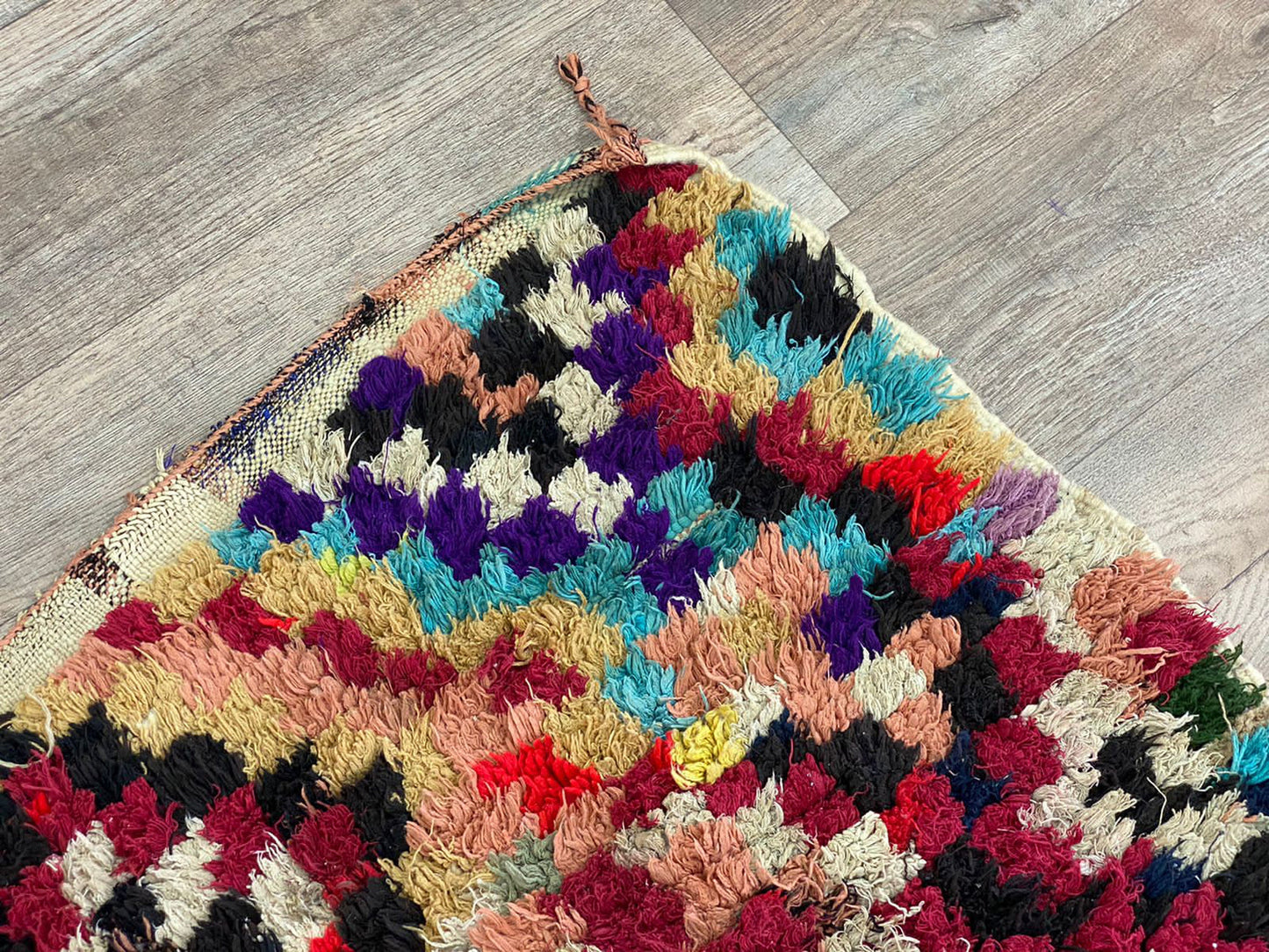 Moroccan narrow checkered 3x8.5 runner rug.