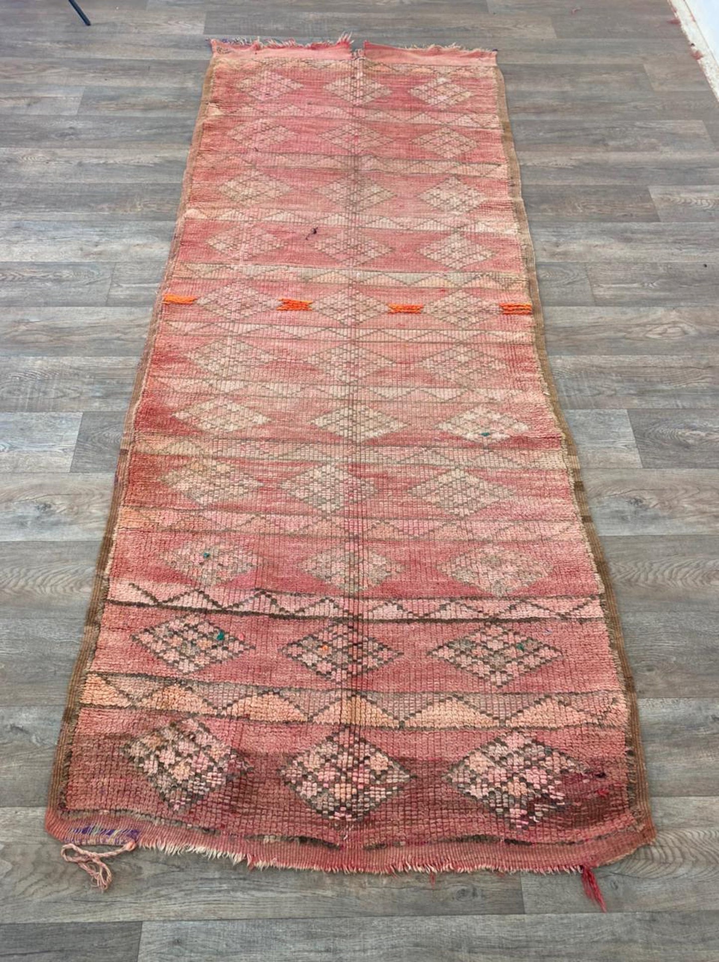 Narrow flat weave tribal 4x10 runner rug.