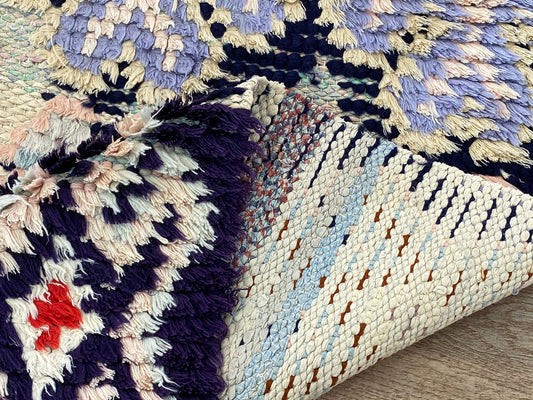 Berber Moroccan faded 2x7 runner rug.