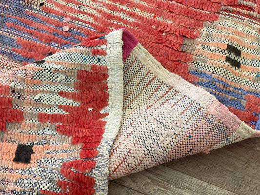 Narrow faded vintage 3x11 runner rug.