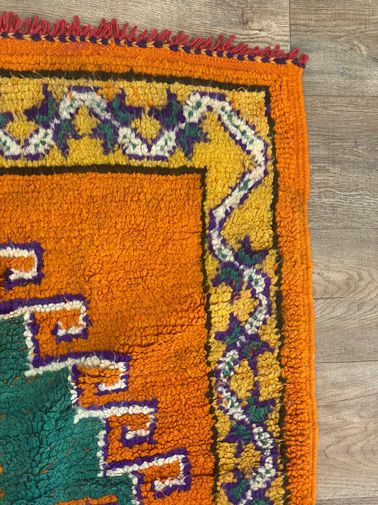 Long colorful Moroccan 4x9 runner rug.