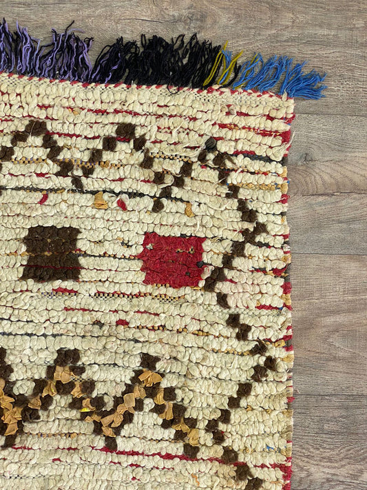 Moroccan small colorful 3x6 rug.