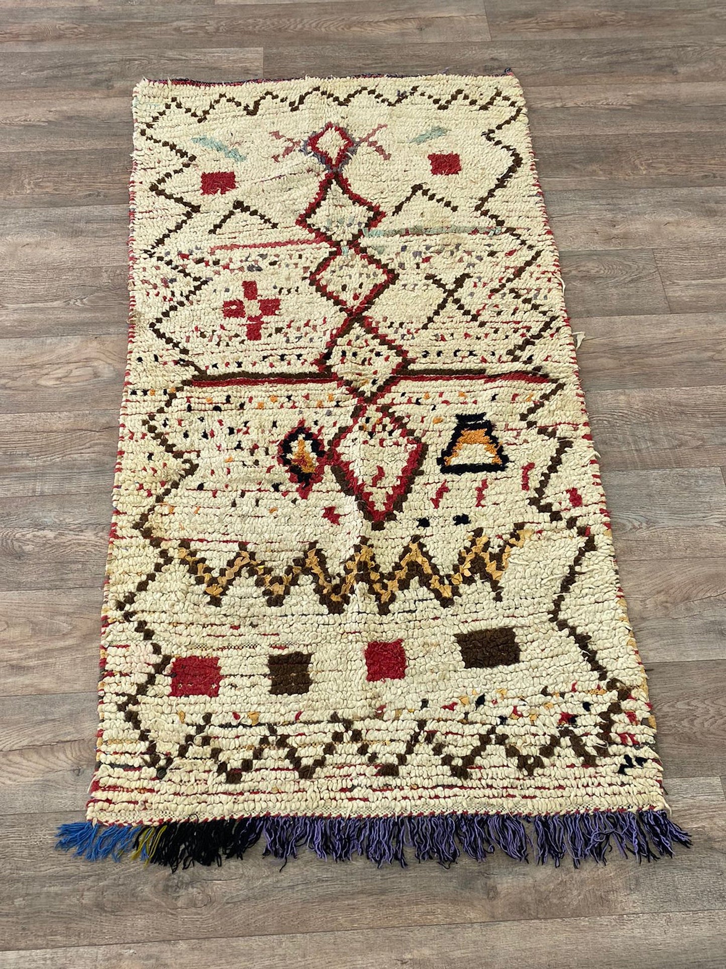Moroccan small colorful 3x6 rug.