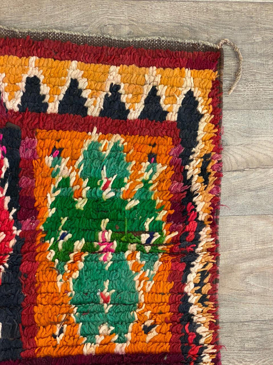 Moroccan narrow abstract 3x8 runner rug.