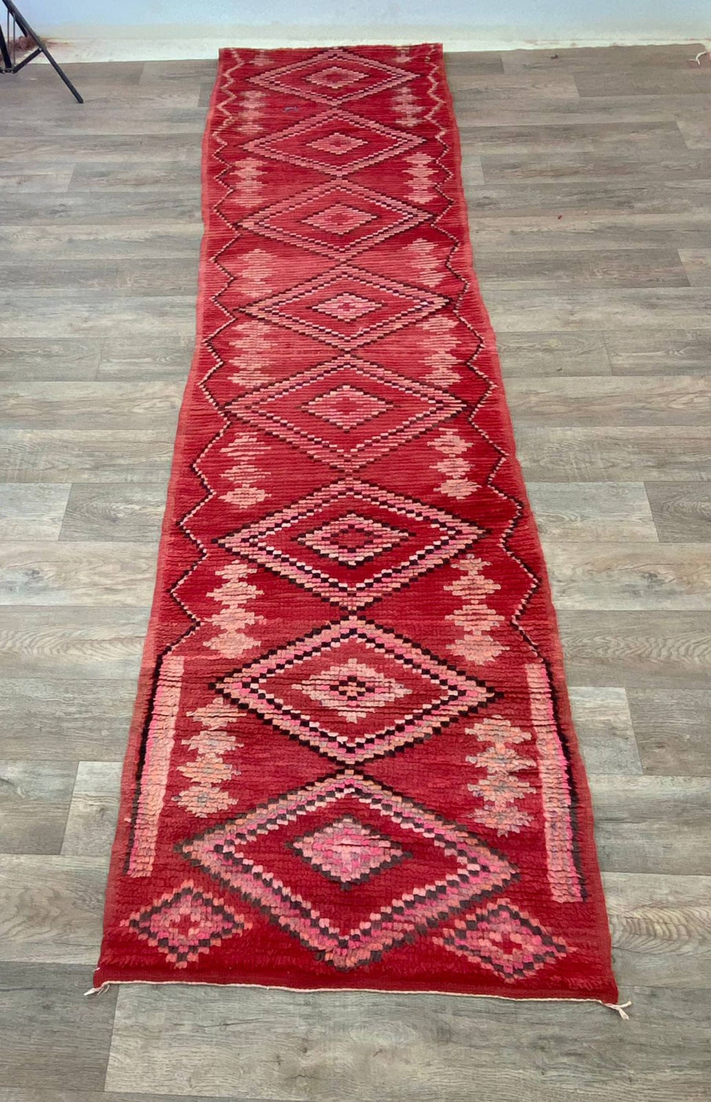 Long Moroccan red 3x14 runner rug.