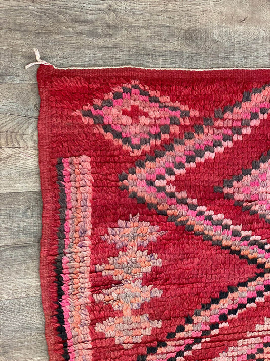 Long Moroccan red 3x14 runner rug.