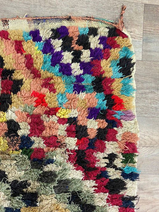 Moroccan narrow checkered 3x8.5 runner rug.