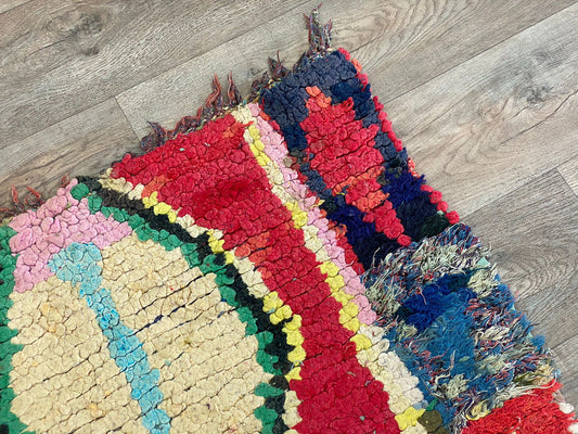 Small colorful Moroccan 3x6 rug.