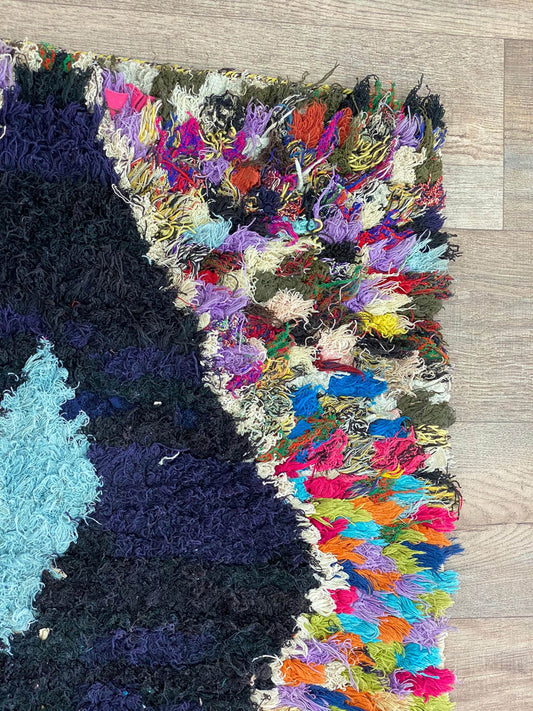 Multi color Moroccan diamond 3x8.5 runner rug.