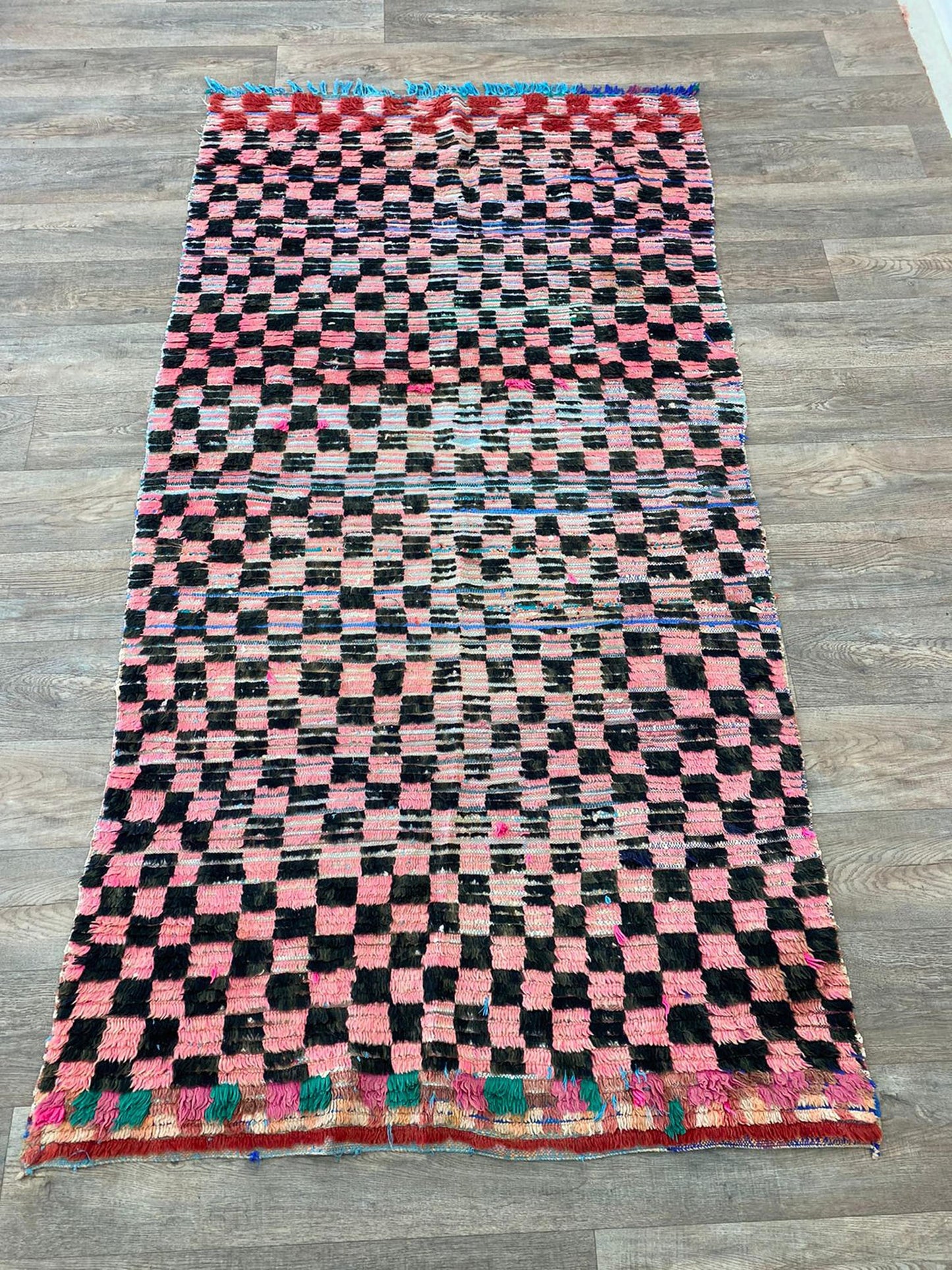 Moroccan checkered colorful 4x8 rug.