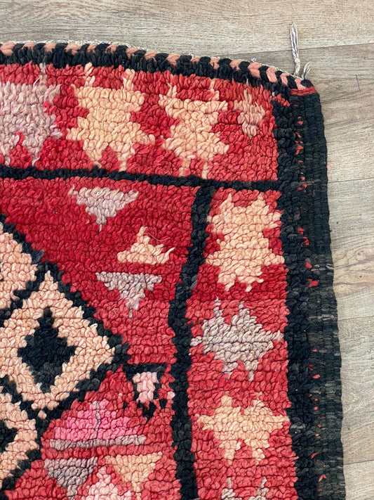 Narrow Moroccan vintage 4x12 runner rug.