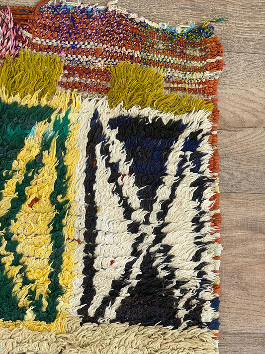 Vintage colorful berber 4x7 rug.