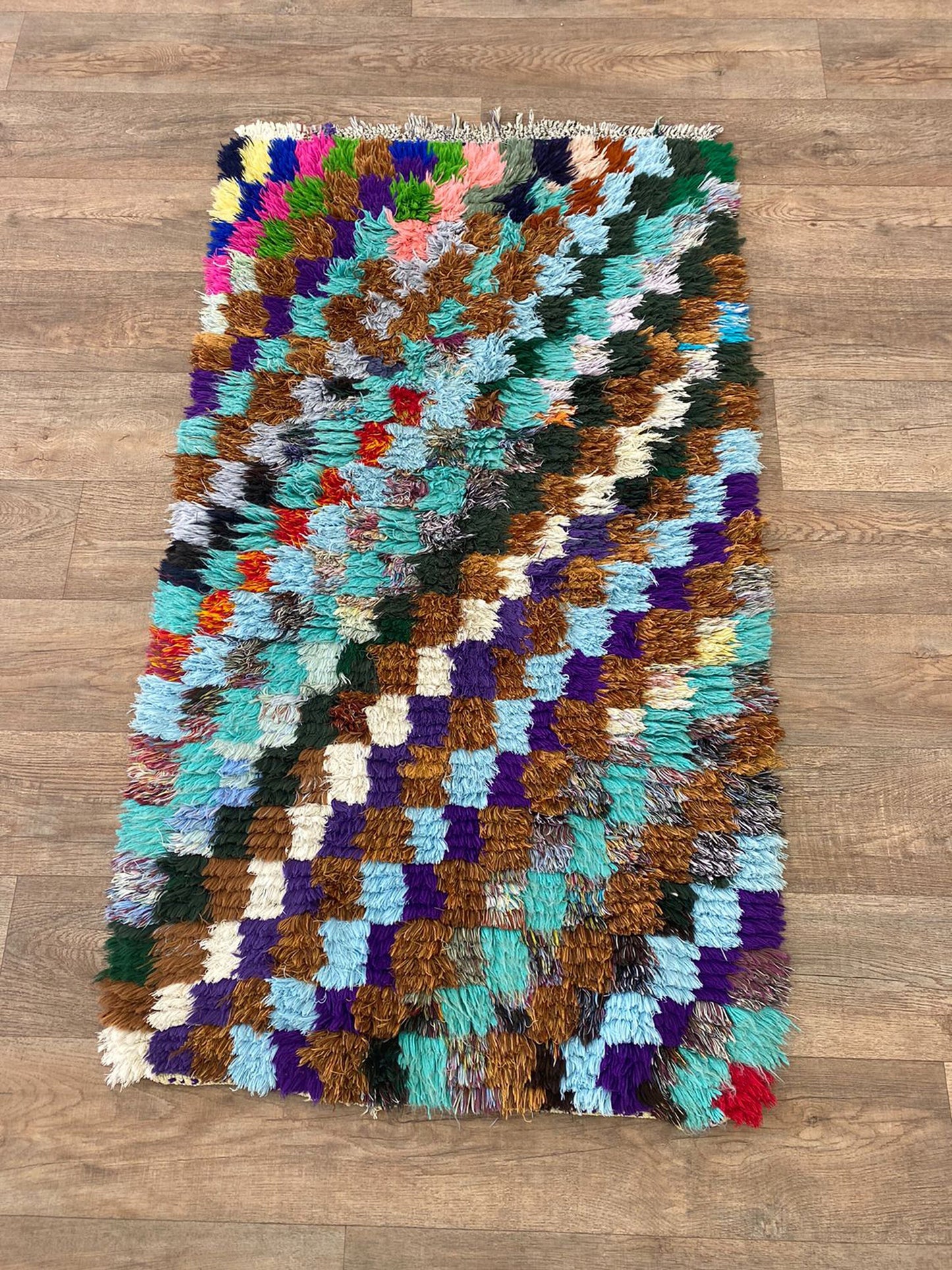 Small colorful checker area 3x5 rug.