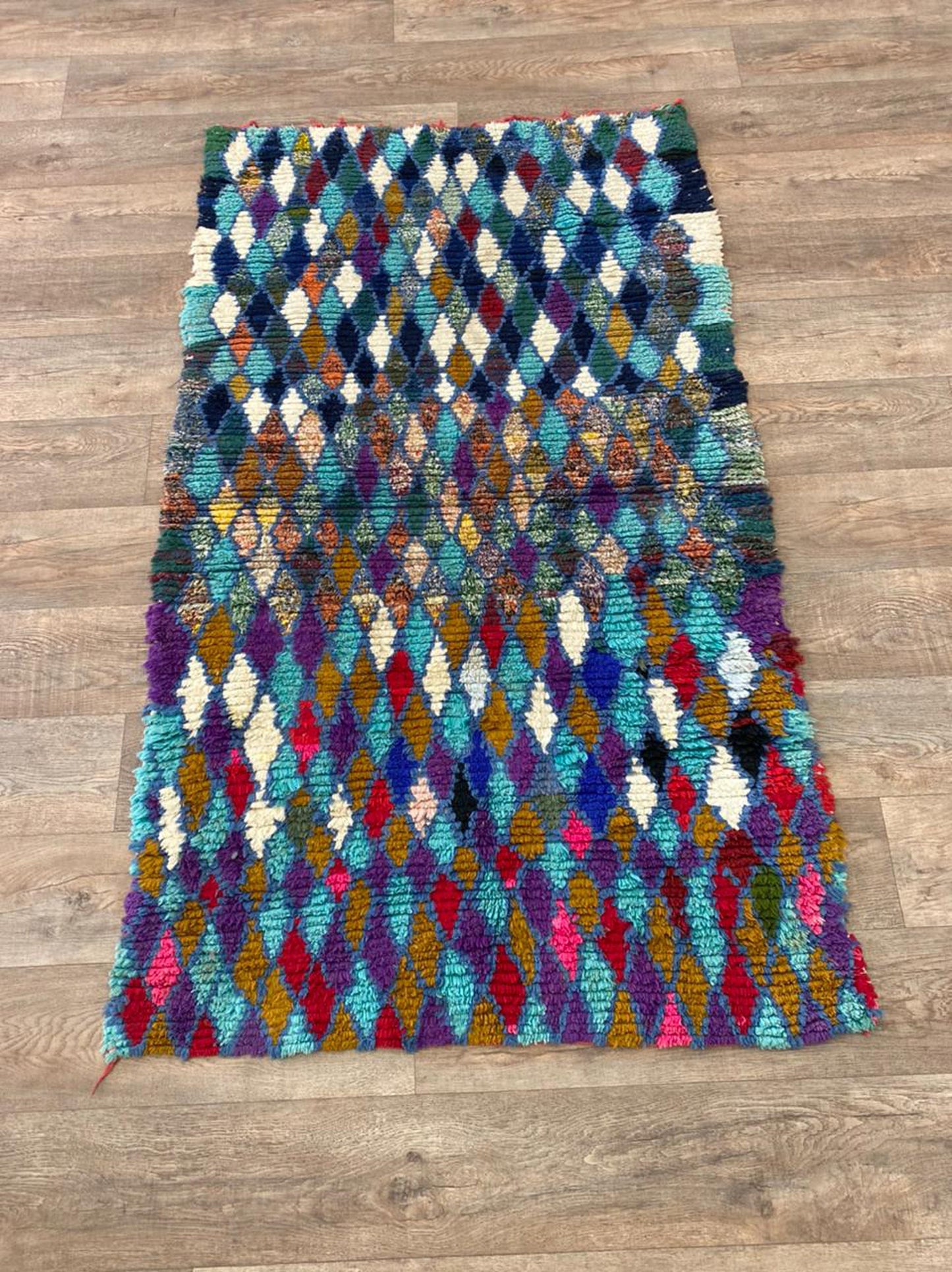 Small colorful diamond area 3.5x6 rug.