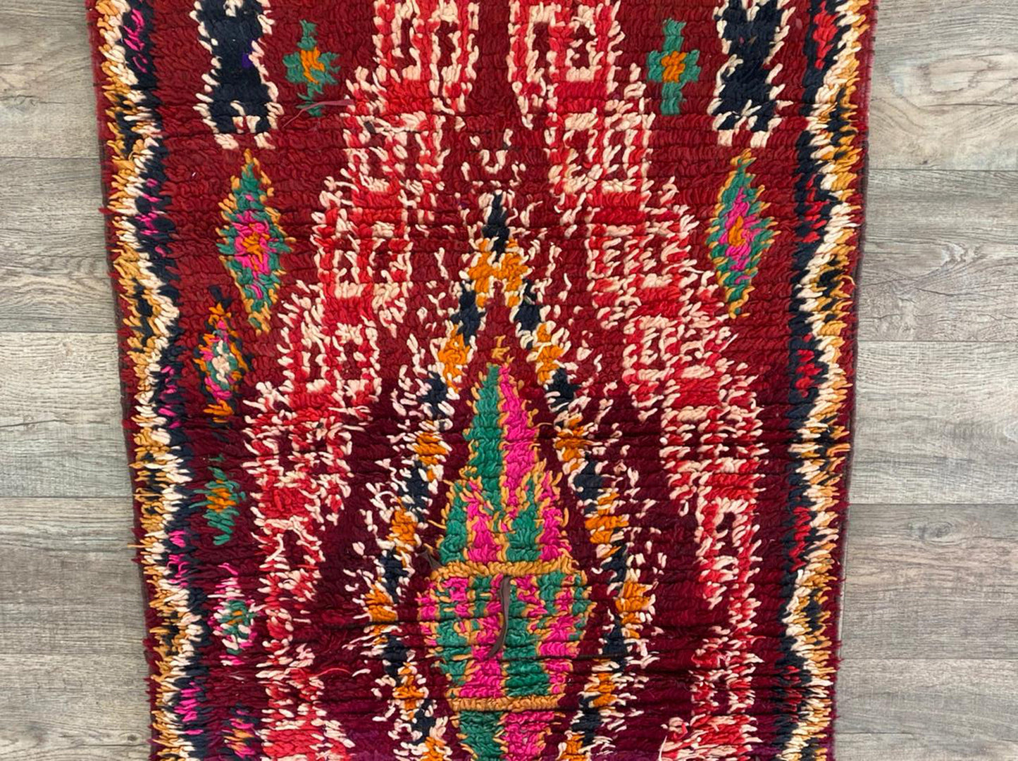Moroccan narrow abstract 3x8 runner rug.