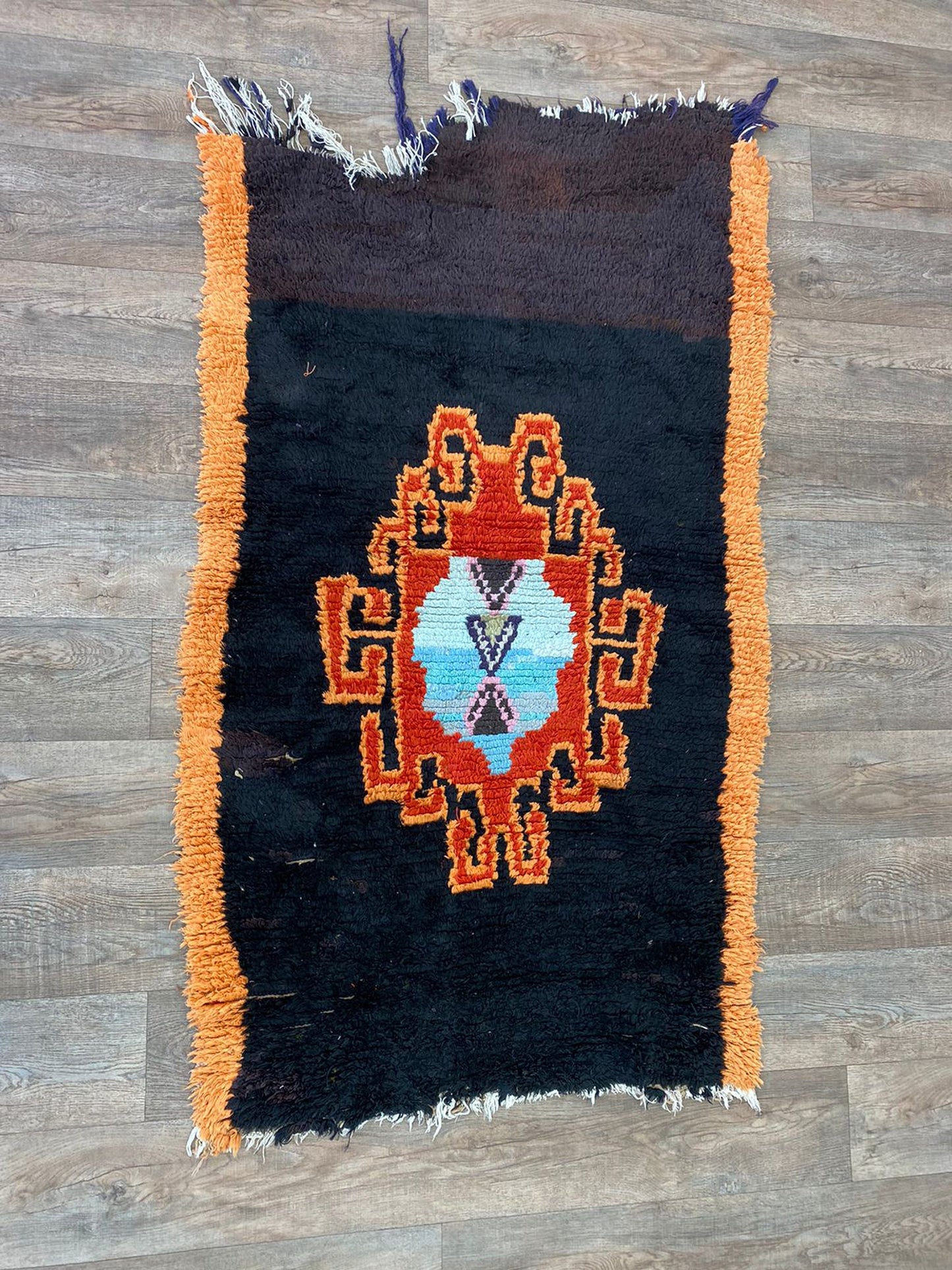 3x6 FT Moroccan black and orange woven area rugs.