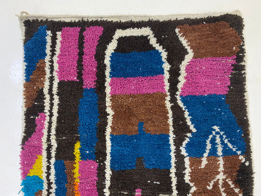 Décoration d'intérieur bohème, tapis marocain coloré fait main.