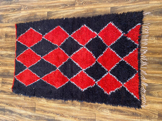 4x7 ft vintage Moroccan area rug.