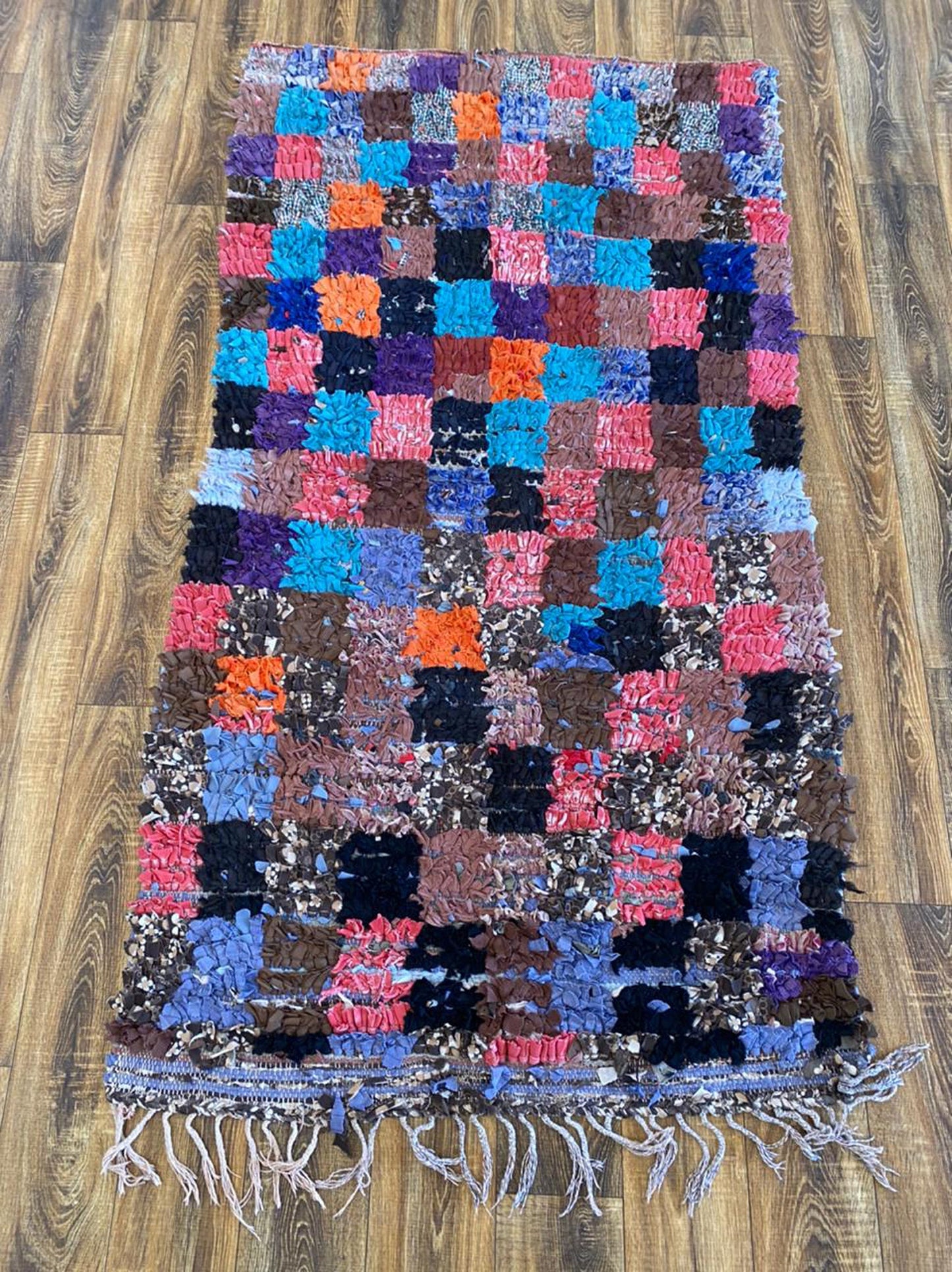 3x6 ft vintage Boucherouite Moroccan rug.