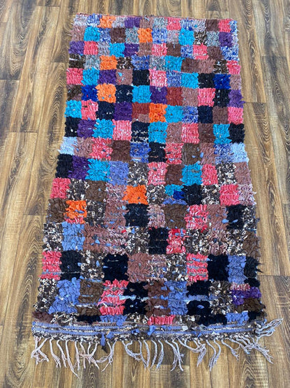 3x6 ft vintage Boucherouite Moroccan rug.