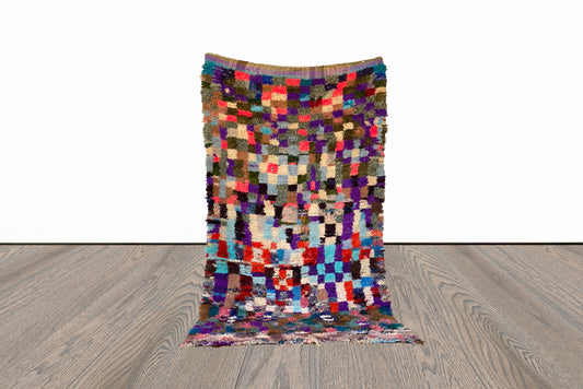 4x8 ft Moroccan woven area rug.
