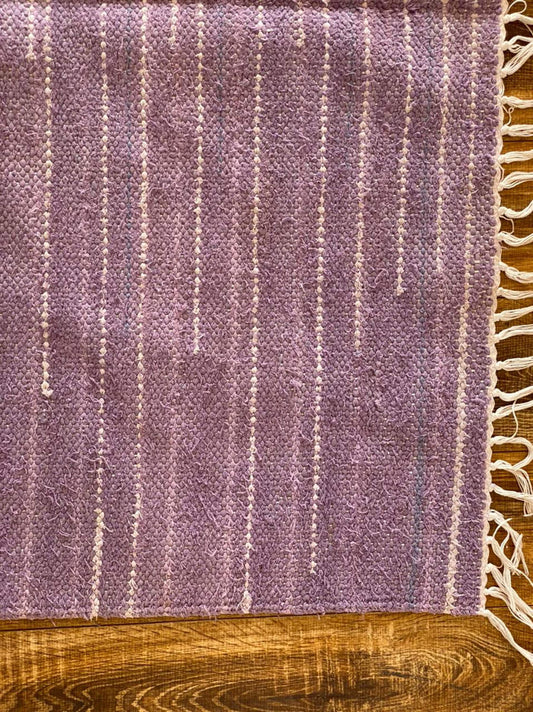 4x7 ft Moroccan purple Berber rug.