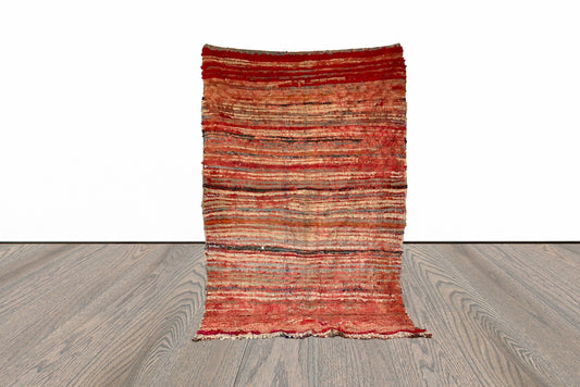 4x7 ft Moroccan Berber worn rug.