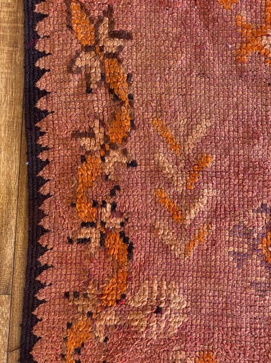 5x10 ft vintage woven Moroccan rug.