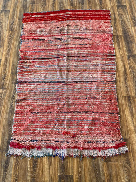 4x7 ft Moroccan Berber worn rug.
