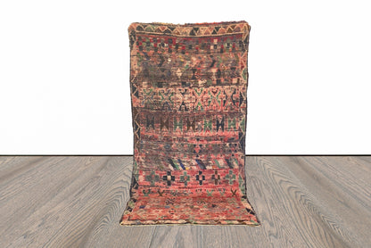 4x9 ft vintage Moroccan Berber rug.