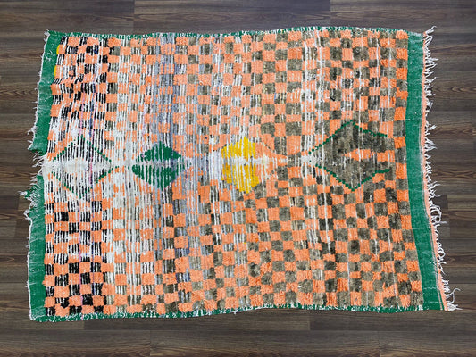 4x6 Moroccan checkered orange and black worn area Rug.
