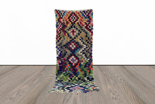 Moroccan narrow checkered 3x8.5 runner rug.