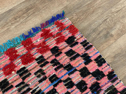 Moroccan checkered colorful 4x8 rug.