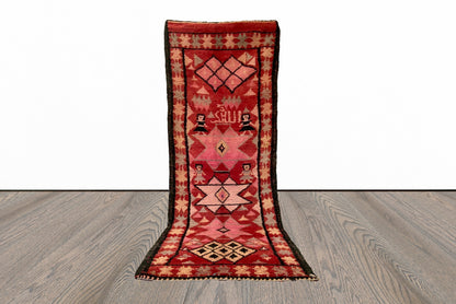 Narrow Moroccan vintage 4x12 runner rug.