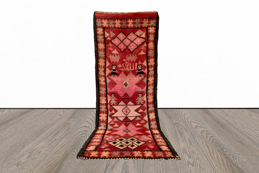 Narrow Moroccan vintage 4x12 runner rug.