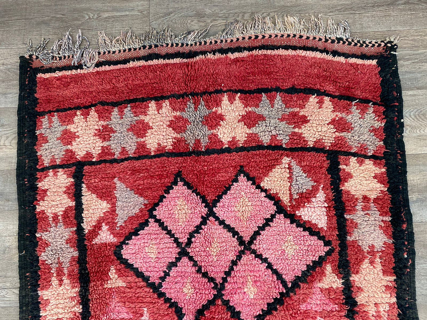 Narrow Moroccan vintage 4x12 runner rug.