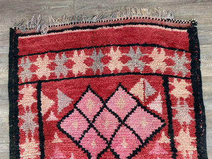 Narrow Moroccan vintage 4x12 runner rug.