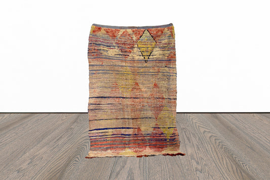 Diamond tribal Moroccan faded 4.5x7 rug.