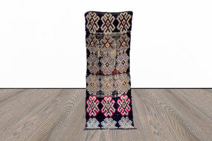 Berber Moroccan faded 2x7 runner rug.
