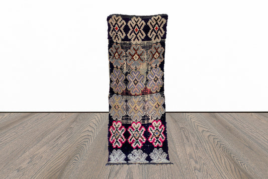 Berber Moroccan faded 2x7 runner rug.